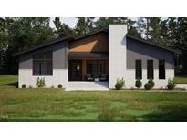 Charming single-story home with covered porch, stone accents, and professionally landscaped front yard at 389 Deer Tail Ln # 39, Fuquay Varina, NC 27526