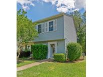 Charming two-story home with blue siding, white trim, and well-maintained landscaping in a desirable neighborhood at 11 Providence Ct, Durham, NC 27705