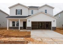 New construction two story home with a two car garage and covered entry at 2238 Cherry Creek Rd, Haw River, NC 27258