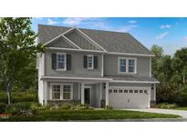 Charming two-story home featuring gray siding, a two-car garage, and a well-manicured lawn at 241 Tidal Pool Way, Cary, NC 27519