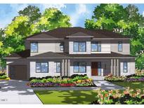 Charming two-story home boasts a modern exterior, well-manicured lawn, and colorful flower beds at 2808 Wexford Forest Ln, Wake Forest, NC 27587