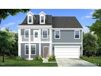 Charming two-story home with gray siding, dormer windows, balcony, well-manicured lawn, and an attached two-car garage at 199 Sugar Pine Drive, Franklinton, NC 27525