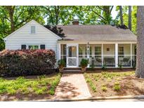 Charming home with a brick walkway and inviting screened-in porch at 2725 Bedford Ave, Raleigh, NC 27607
