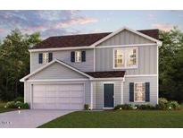 Charming two-story home with a spacious two-car garage and neatly landscaped front yard at 5040 Harrier Dr, Snow Camp, NC 27349