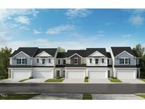 New townhomes featuring attached garages, neutral paint scheme and modern architectural details at 120 Malbec Dr, Chapel Hill, NC 27516