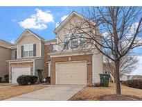 Charming exterior of home featuring attached garage, and manicured landscaping at 4007 Newell Ln, Raleigh, NC 27616