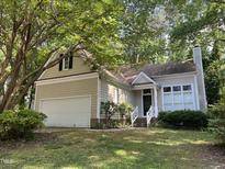 Charming single-Gathering home with a two-car garage and well-maintained front yard at 713 Beddingfield Dr, Knightdale, NC 27545
