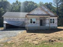 New home exterior showing the front entrance, garage and some windows at 13159 S Nc-231 Hwy, Middlesex, NC 27557