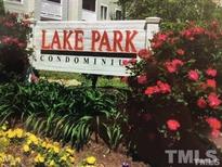 Close up of the Lake Park Condominium sign surrounded by landscaping at 1331 Crab Orchard Dr # 001, Raleigh, NC 27606