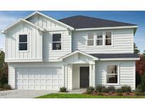 Charming two-story home features a two-car garage, neutral paint, and well-manicured lawn at 147 Gobbler Dr, Smithfield, NC 27577