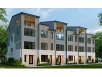 Modern townhome exterior with white brick, gray siding, and balconies at 406 Chatham View Rd, Cary, NC 27511