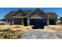 Charming single Gathering home, light gray, showing construction progress at 91 Retreat Run, Smithfield, NC 27577