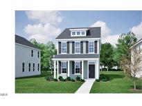 Charming two-story home with a welcoming front porch, green lawn, and simple, well-maintained landscaping at 736 Georgias Landing Pkwy # 7, Raleigh, NC 27603