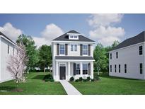 Charming two-story home with gray siding, dark shutters and a welcoming front porch at 756 Georgias Landing Pkwy # 3, Raleigh, NC 27603