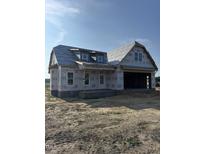 New construction of a two-story home with an attached two-car garage in a rural location at 1301 Parkertown Rd, Four Oaks, NC 27524
