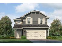 Charming two-story home with gray siding, white trim, and a two-car garage at 179 New Twin Branch Ct, Smithfield, NC 27577