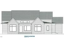 Front elevation of home with stone accents, horizontal siding, and multiple windows at 60 Park Meadow Ln, Youngsville, NC 27596
