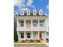 Charming two-story home with double porches, light green shutters, and decorative columns at 1211 Gloriosa St, Apex, NC 27523
