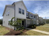 New townhomes feature modern architectural design and beautiful landscaping at 6441 Granite Quarry Dr, Raleigh, NC 27610