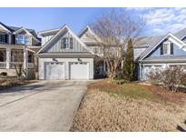Charming home with a two-car garage and well-maintained front yard at 2721 Cameron Pond Dr, Cary, NC 27519