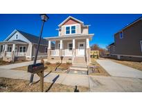 Charming two-story home with white pillars, front yard and inviting curb appeal at 105 Ambergate Ct, Rocky Mount, NC 27804