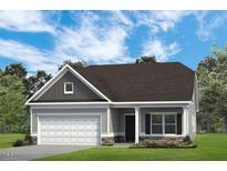 Charming single-story home with a well-maintained lawn, gray siding, and an attached two-car garage at 75 E American Marigold Dr # 37, Benson, NC 27504