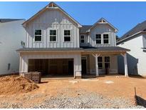 New two-story home featuring board and batten siding and an attached two-car garage at 448 Golden Dragonfly St, Wake Forest, NC 27587