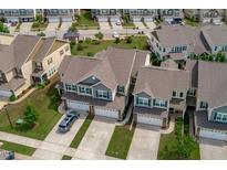 Beautiful aerial view of townhomes featuring a well-maintained community and landscaping at 210 Mayfield Dr, Apex, NC 27539