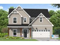 Charming two-story home featuring a classic design and a two-car garage at 70 Nebbiolo Dr, Youngsville, NC 27596
