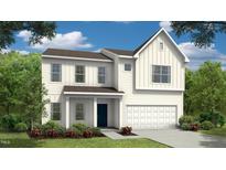 Charming two-story home with a white exterior, landscaped yard, and a welcoming front entrance at 86 Oak Meadow Ln, Angier, NC 27501