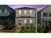 Charming two-story home with covered porch and inviting curb appeal at 190 Wendover Pkwy, Pittsboro, NC 27312