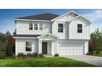 Charming two-story home with a two-car garage and inviting front yard at 127 Caspian Ct, Lillington, NC 27546