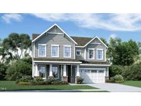 Charming two-story home featuring gray siding, white trim, and a well-manicured front yard at 2964 Hanging Valley Way, Wake Forest, NC 27587