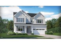 Charming two-story home featuring white siding, gray shutters, and a well-manicured front lawn at 2968 Hanging Valley Way, Wake Forest, NC 27587