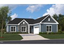 Charming single-story home with a combination of stone and siding exterior and a well-manicured front lawn at 1207 Masters Place Way # 184, Durham, NC 27703