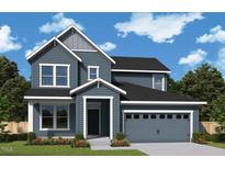 Charming two-story home with a two-car garage, a cozy front porch, manicured landscaping, and beautiful curb appeal at 33 Cozy Hvn, Fuquay Varina, NC 27526