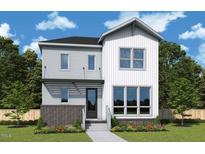 New two-story home boasts modern design, brick accents, covered entry, and professional landscaping at 339 Parkland Dr, Pittsboro, NC 27312
