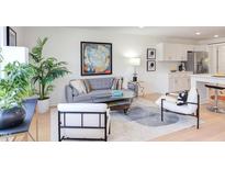Bright living room featuring stylish furnishings and an open layout, perfect for modern living at 1309 Hudson Ave # D12, Durham, NC 27705