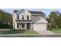 Charming two-story home featuring a two-car garage and a combination of stone and siding accents at 43 Regal Gardens Ct, Angier, NC 27501