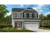 Charming two-story home with a gray exterior, red front door, and attached two-car garage at 215 Blue Butterfly Dr, Angier, NC 27501