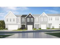 New construction townhome with a one-car garage and traditional architectural details at 84 Blossom Field Way, Angier, NC 27501