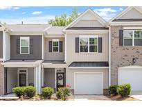 Charming townhome with varied siding and an attached single-car garage at 174 Walking Path Pl, Hillsborough, NC 27278
