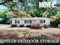 Charming move-in ready one-story home on 2.62 acres offers lots of outdoor storage at 4509 Stevens Chapel Rd, Smithfield, NC 27577