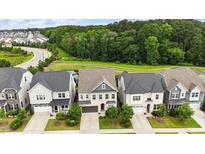 New construction homes feature manicured lawns and an inviting community atmosphere at 113 Mazarin Ln, Cary, NC 27519