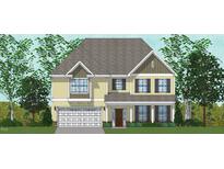 Charming two-story home with a neutral color palette, complemented by a gable roof and a convenient two-car garage at 60 Bold Dr, Youngsville, NC 27596