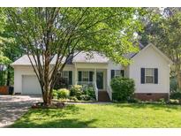 Charming single-Gathering home with well-manicured lawn and beautiful landscaping at 154 Jared Dr, Fuquay Varina, NC 27526