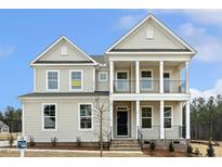Charming two-story home with a welcoming front porch and a visible 'Available' sign at 25 Long Needle Ct # 37, Youngsville, NC 27596