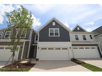 Charming home with a large garage and a well-manicured lawn and beautiful curb appeal at 914 Montague Ave, Durham, NC 27703