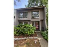 Inviting two-story home with a well-maintained front yard and lush landscaping at 1708 Quail Ridge Rd, Raleigh, NC 27609