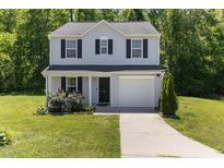 Charming two-story home with light gray siding, black shutters, and a well-maintained front yard at 194 Catskill Ct, Burlington, NC 27217